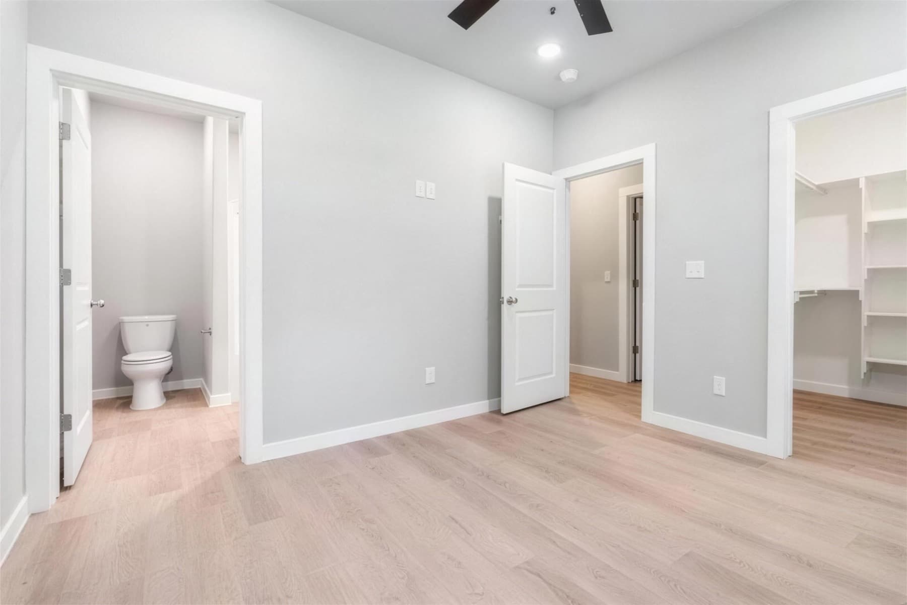 Bedroom with private bath and walk-in closet